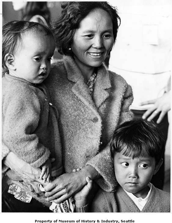 Mrs. Nhon Ke Nguyen and sons at Sea-Tac airport.jpeg