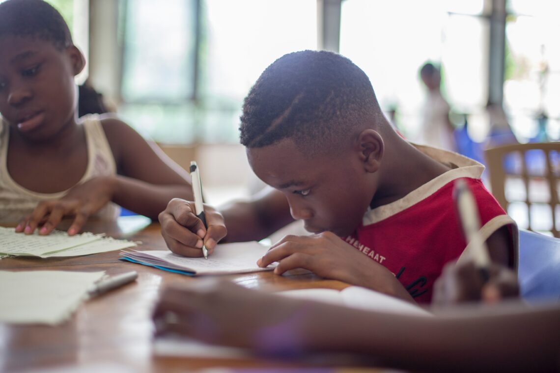 Child Writing in class